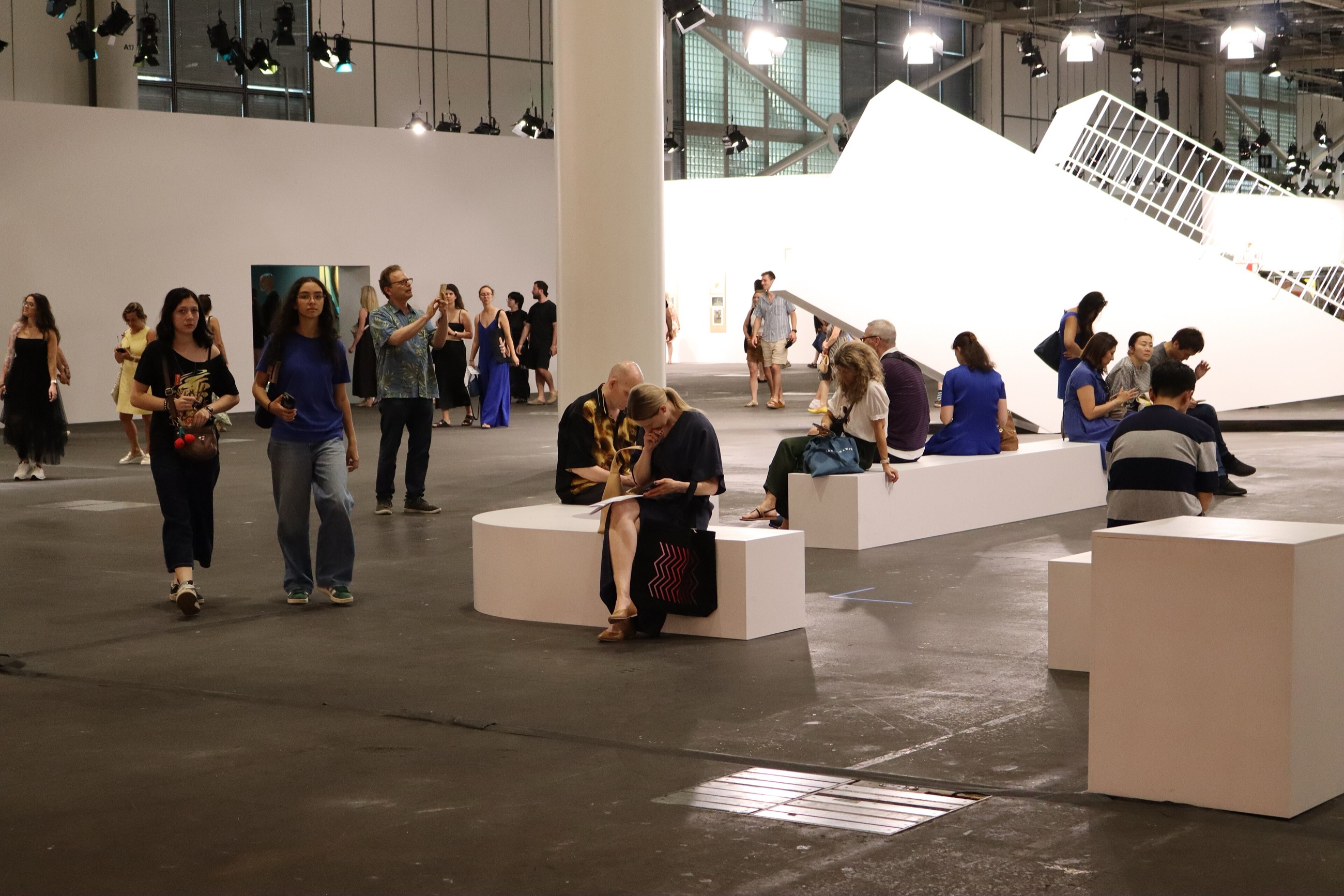 Visitors moving through the Unlimited hall at Art Basel, Messe Basel